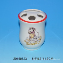 Lovely ceramic tooth brush holder with monkey decal